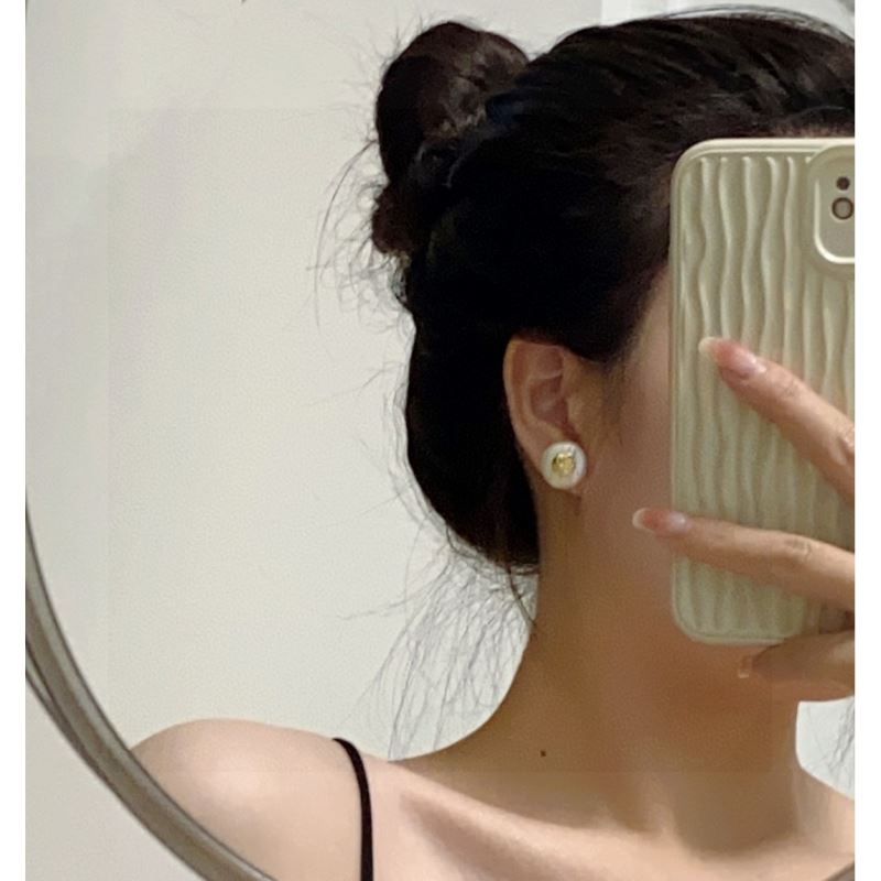 Ch*el earrings